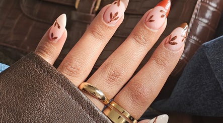 Elegant nail art at The Glow Way - TGW in Bedford, England, GB showcases intricate leaf designs.