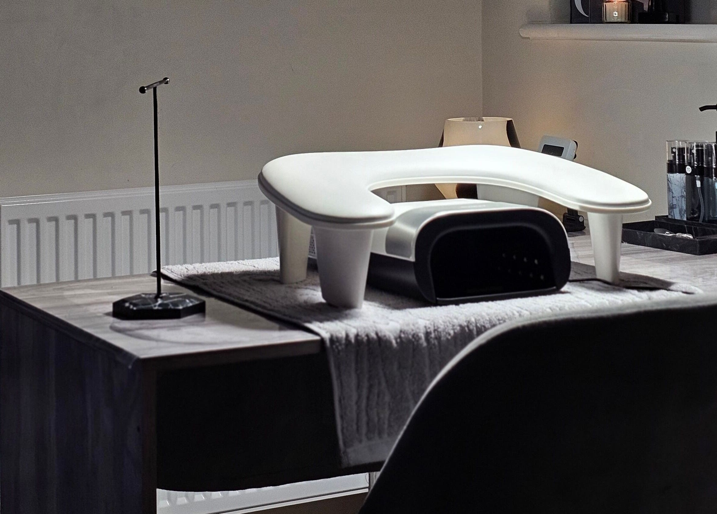 Nail table setup at The Glow Way - TGW in Bedford, England, GB, featuring modern tools and serene ambiance.