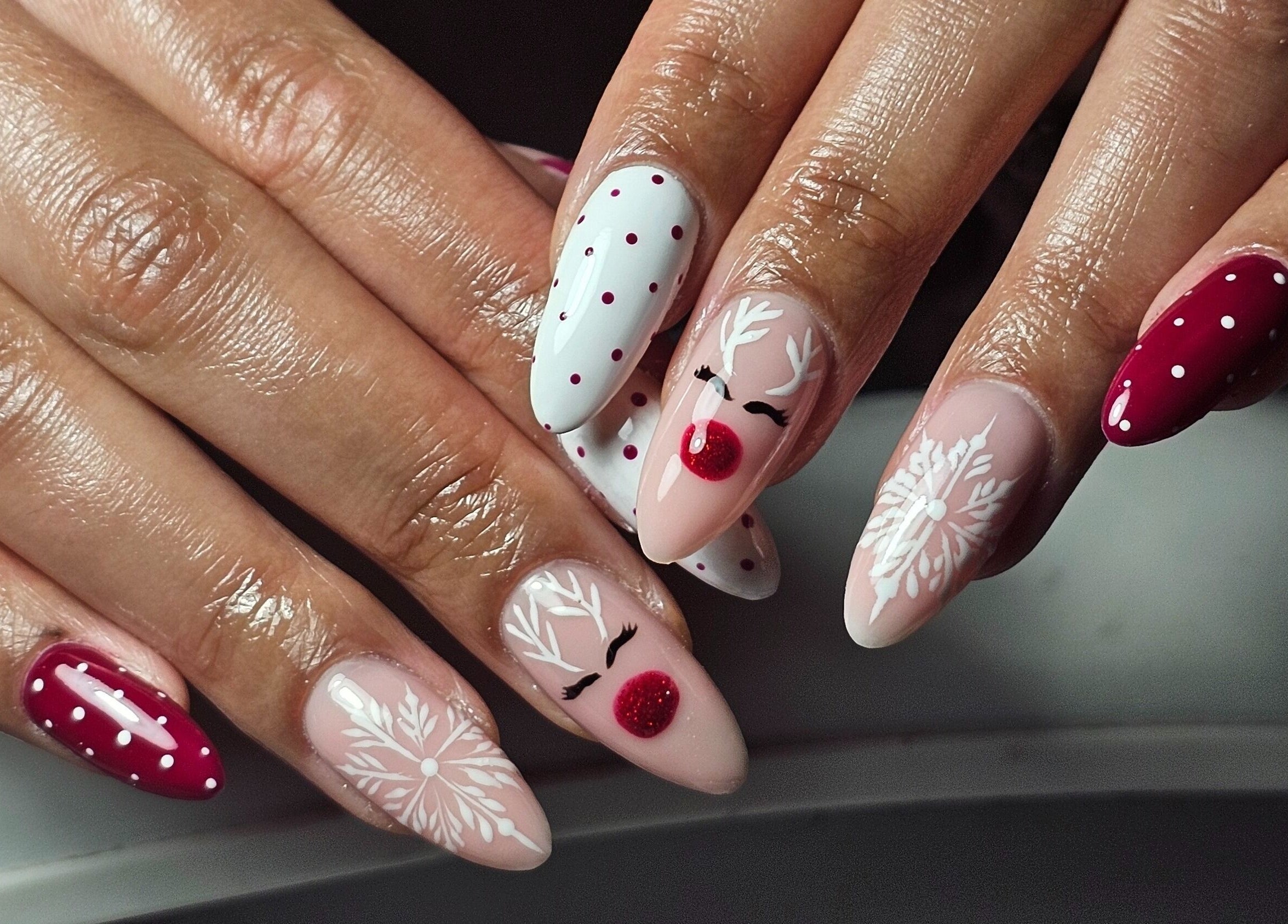 Elegant reindeer nail art at The Glow Way - TGW in Bedford, England, GB.