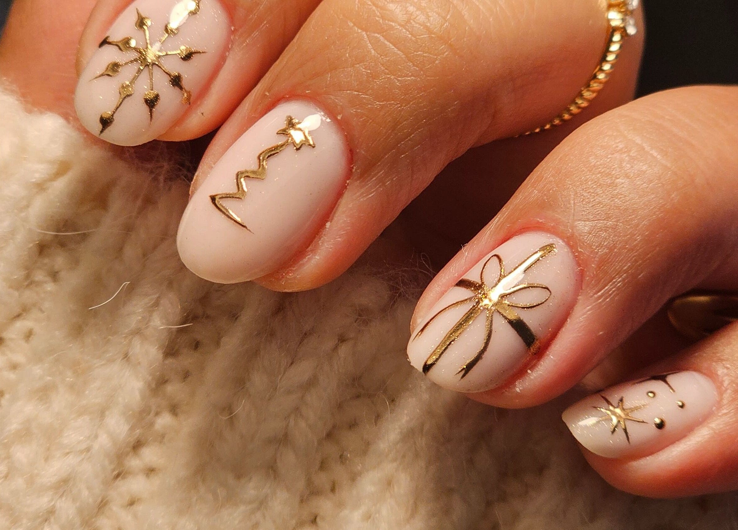 Elegant gold nail art by The Glow Way - TGW, Bedford, England, GB showcasing intricate designs.