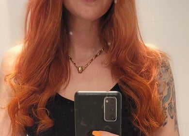 Vibrant ginger hair styled in waves at Hair Beauty Studio - Slavic Hair Extensions, Melbourne, Victoria, AU.