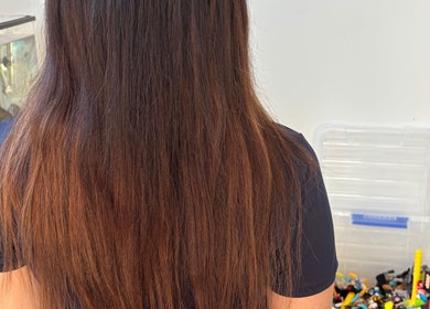 Back view of long, smooth hair at Hair Beauty Studio - Slavic Hair Extensions, Melbourne, Victoria, AU.
