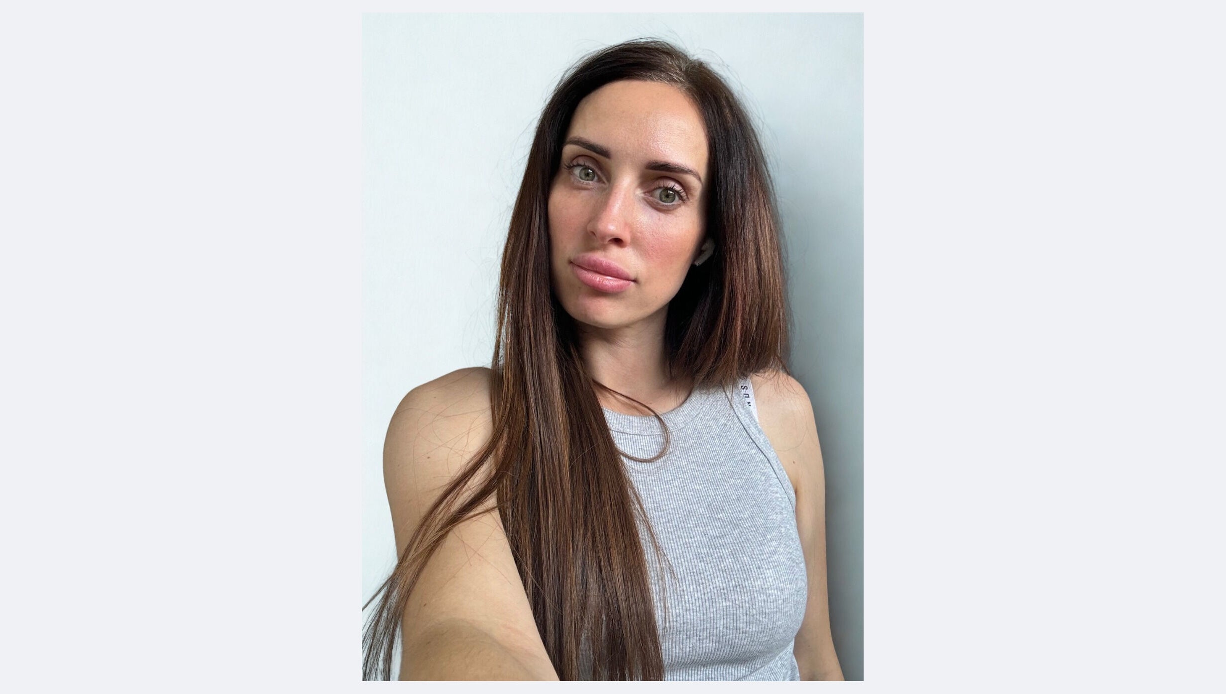 Client showcases long brunette Slavic Hair Extensions at Hair Beauty Studio, Melbourne, Victoria, AU.