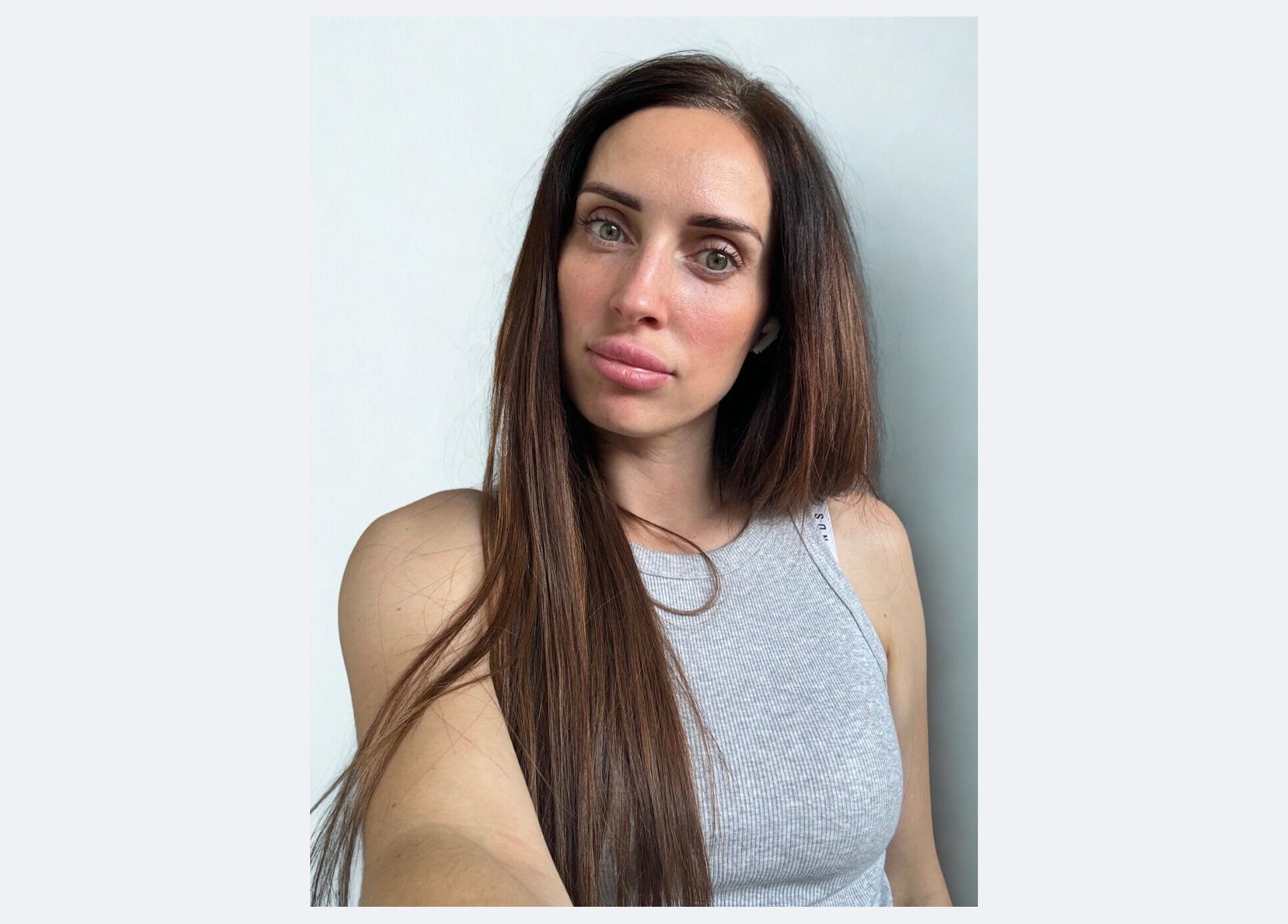 Client showcases long brunette Slavic Hair Extensions at Hair Beauty Studio, Melbourne, Victoria, AU.