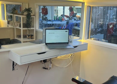 Bright salon setup at Dasa Luxe, Manchester, England, GB, showcasing sleek design and contemporary elegance.