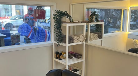Dasa Luxe interior with towels and products, Manchester, England, GB. Elegant beauty and wellness atmosphere.