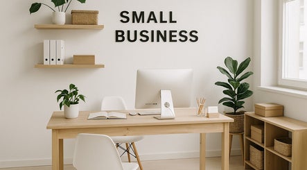 Modern minimalist office space at Stardaughterworks, Chennai, IN with plants and natural light.