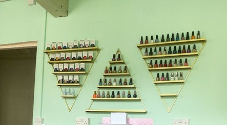 Geometric shelves with nail polish at Ritual Nail Spa, Hebden Bridge, England, GB for vibrant nail care.