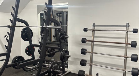 Fitness equipment at Coached By Laura, Aberdeen, Scotland, GB, offering strength training facilities.