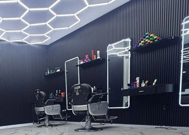Modern interior of Unique Barbershop Hamilton New Zealand in Hamilton, Waikato Region, NZ with barber chairs.