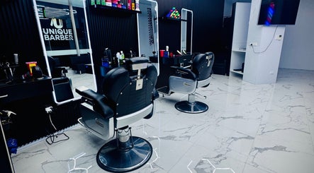 Modern interior of Unique Barbershop Hamilton New Zealand featuring sleek barber chairs in Hamilton, Waikato Region, NZ.
