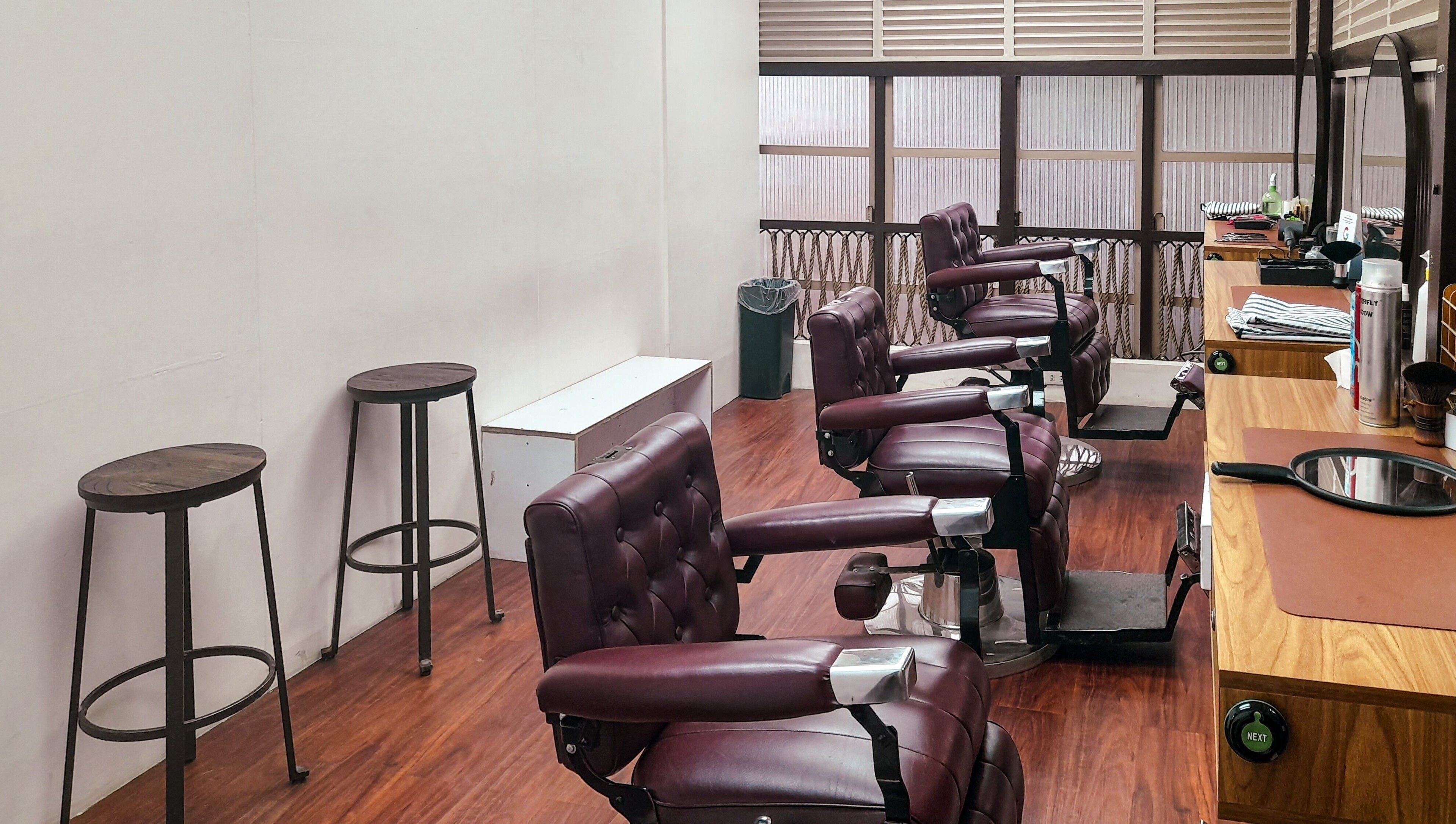 Chic barber chairs at Manong Barbers - Angono, Rizal, Angono, Calabarzon, PH, offering stylish grooming.
