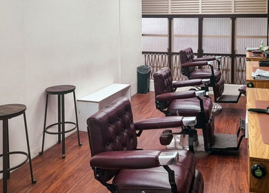 Chic barber chairs at Manong Barbers - Angono, Rizal, Angono, Calabarzon, PH, offering stylish grooming.