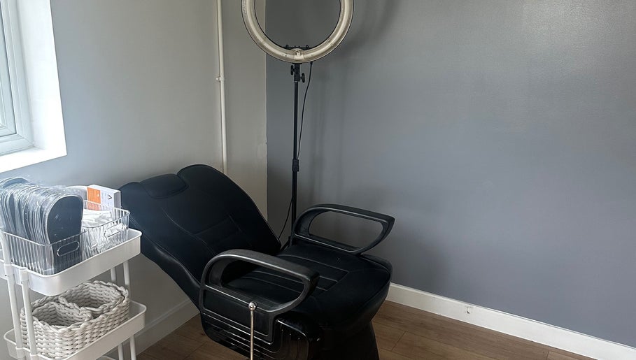 Comfortable chair and ring light setup at The Tanning Hut, Doncaster, England, GB.
