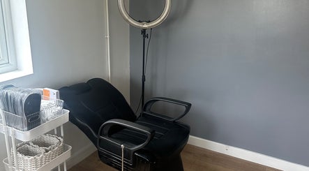 Comfortable chair and ring light setup at The Tanning Hut, Doncaster, England, GB.
