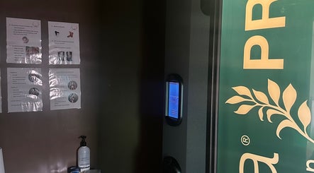 Instructions in tanning booth at The Tanning Hut, Doncaster, England, GB, displaying tanning guidelines.