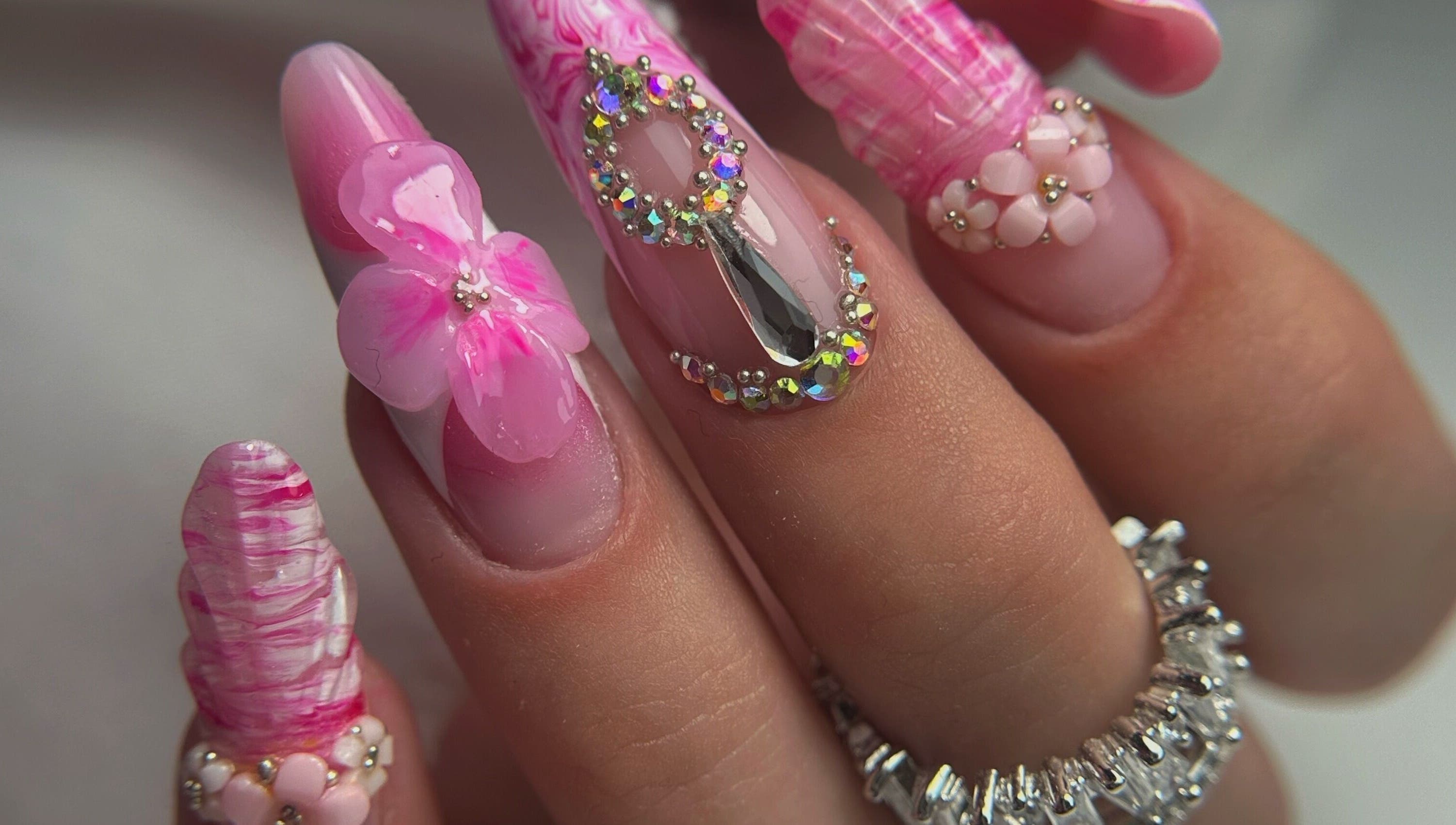 Intricate pink floral nail art from Daniela Siantova Nail Courses, Hull, England, GB.