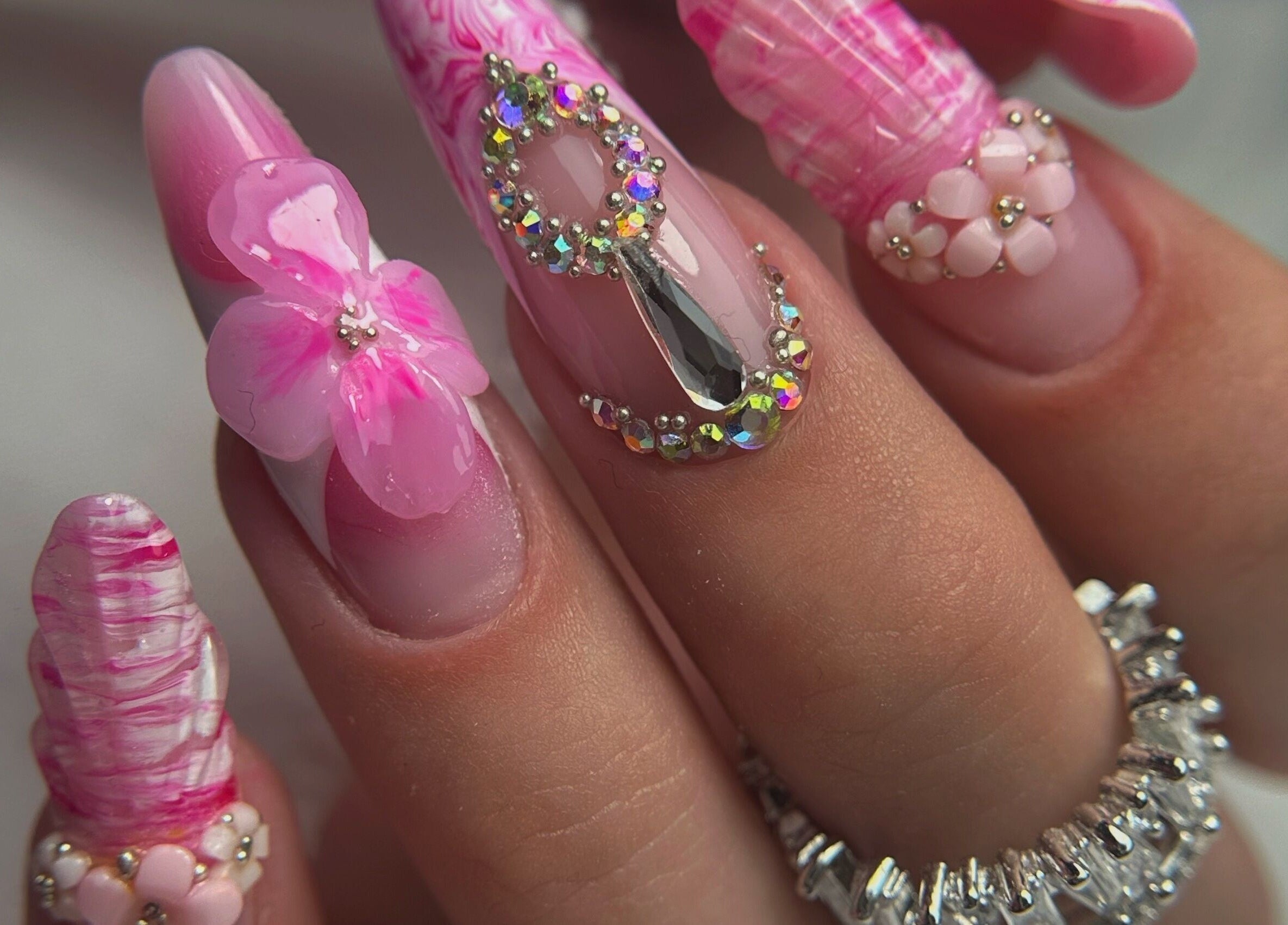 Intricate pink floral nail art from Daniela Siantova Nail Courses, Hull, England, GB.