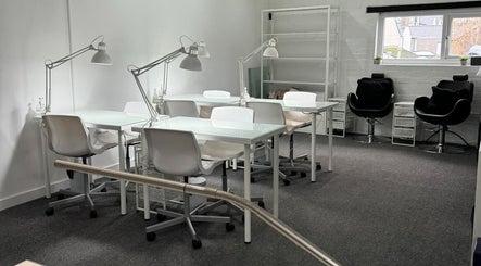 Elegant nail studio at Kate Brooks ~ Nail Artist, Llandudno, Wales, GB. Featuring modern workstations and chic decor.