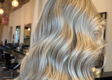 Elegant silver-blonde waves at Mbhairdressing, Forest Hall, Newcastle Upon Tyne, England, GB.