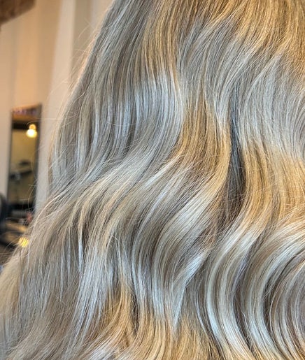 Elegant silver-blonde waves at Mbhairdressing, Forest Hall, Newcastle Upon Tyne, England, GB.