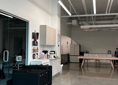 Modern interior of Inked by Kings, Salt Lake City, Utah, US, showcasing a sleek workspace with minimalist design.