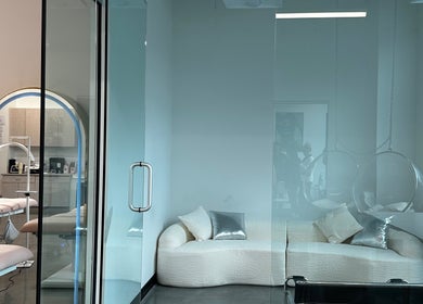 Chic lounge area at Inked by Kings in Salt Lake City, Utah, US with modern decor and sleek furnishings.