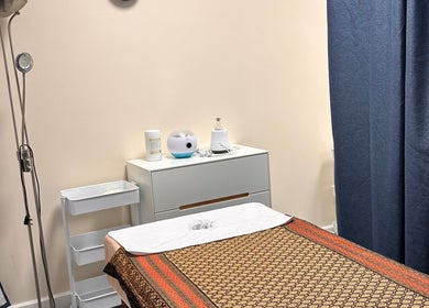 Relaxing massage room at Thaidy Massage, Newport, Wales, GB with a serene ambiance and comfortable massage table.