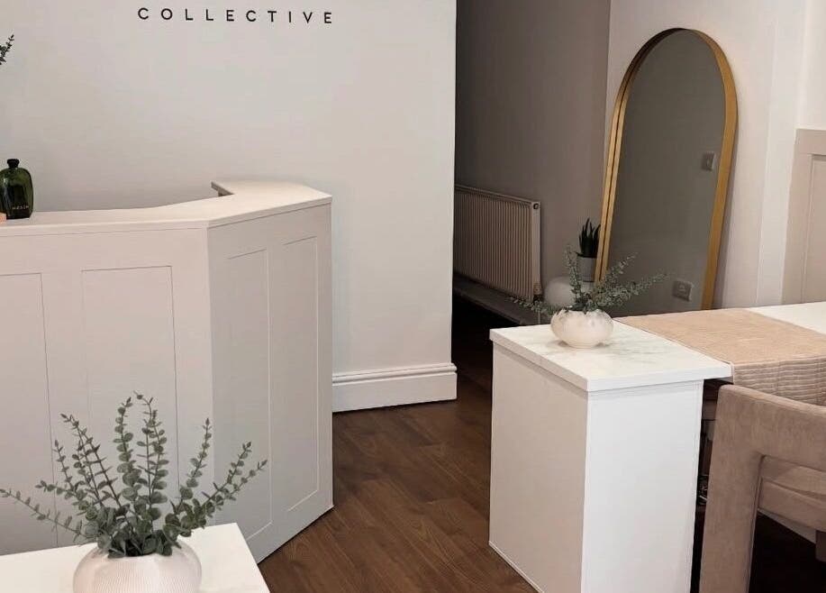 Elegant reception area at Halo Skin Lab in Worsley, England, GB featuring decor and seating.