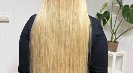 Long, straight blonde hair showcased at Hair Heaven, County Kilkenny, County Kilkenny, IE.