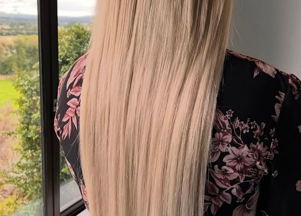 Smooth, long blonde hair styled at Hair Heaven Hair and Lash Extensions, Kilkenny, County Kilkenny, IE.