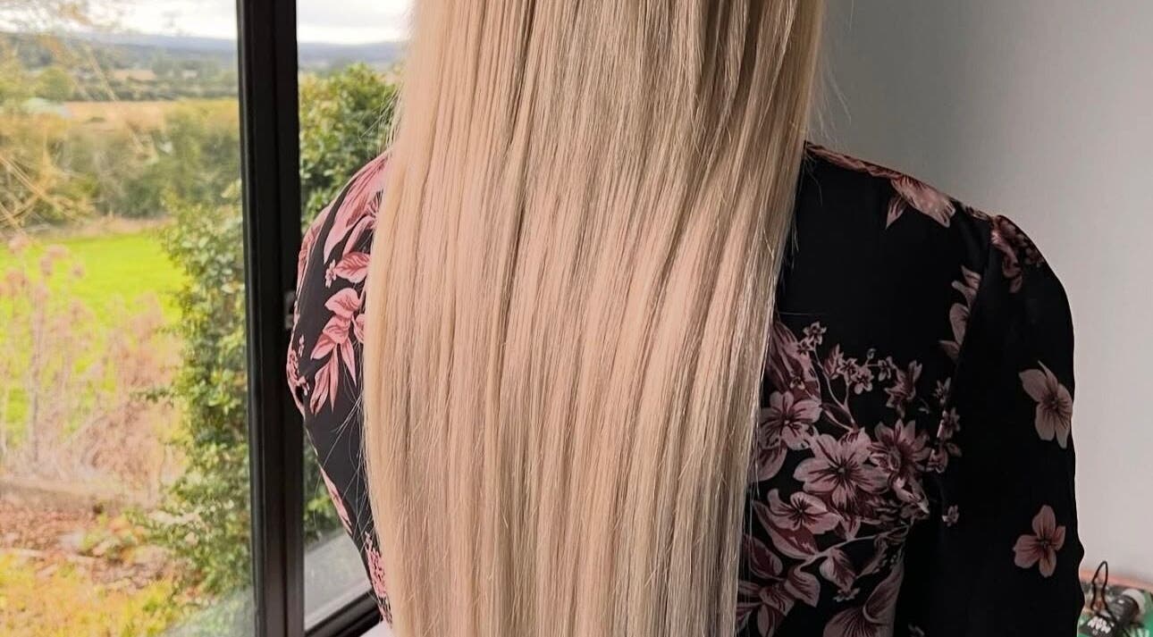 Smooth, long blonde hair styled at Hair Heaven Hair and Lash Extensions, Kilkenny, County Kilkenny, IE.
