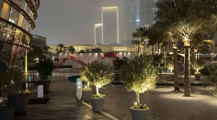 Evening view at J-blendz with lit palm trees, Casablanca, Casablanca-settat, MA.