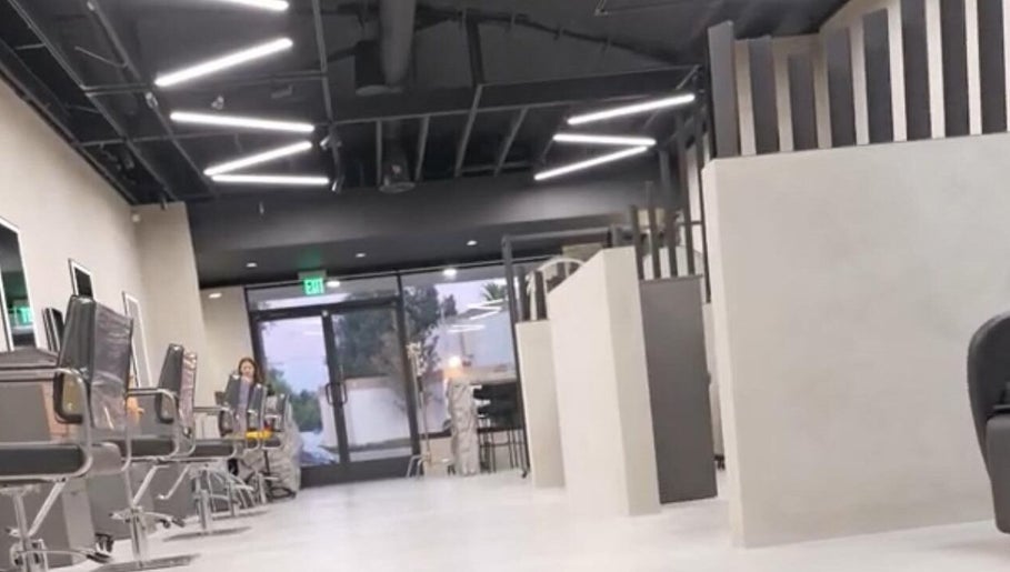 Modern interior of Marko Beauty Salon in Glendale, California, US, showcasing sleek styling stations.