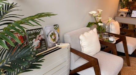 Comfortable waiting area at Rivera Spa and Massage, Christchurch, Canterbury Region, NZ with magazines and plants.