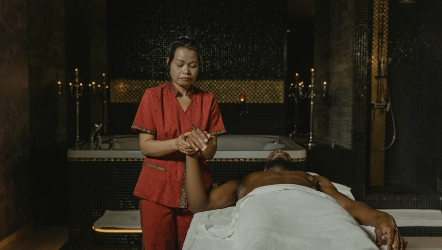 Massage therapy session at The King’s Cosmetics in New York, New York, US, showcasing relaxation and care.