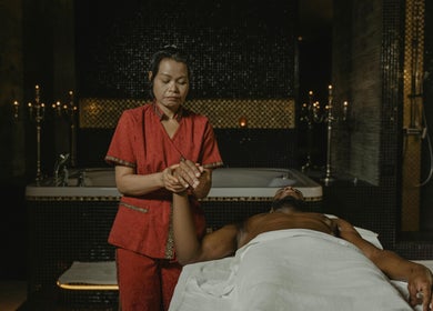 Massage therapy session at The King’s Cosmetics in New York, New York, US, showcasing relaxation and care.