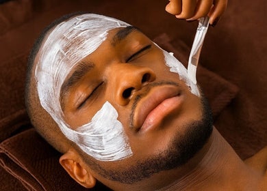 Man enjoying facial mask at The King’s Cosmetics, New York, New York, US for ultimate relaxation.