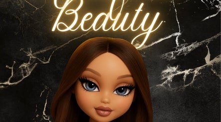 Stylized doll with glowing sign at Mollified Beauty, Maidstone, England, GB. Exquisite allure in elegant setting.