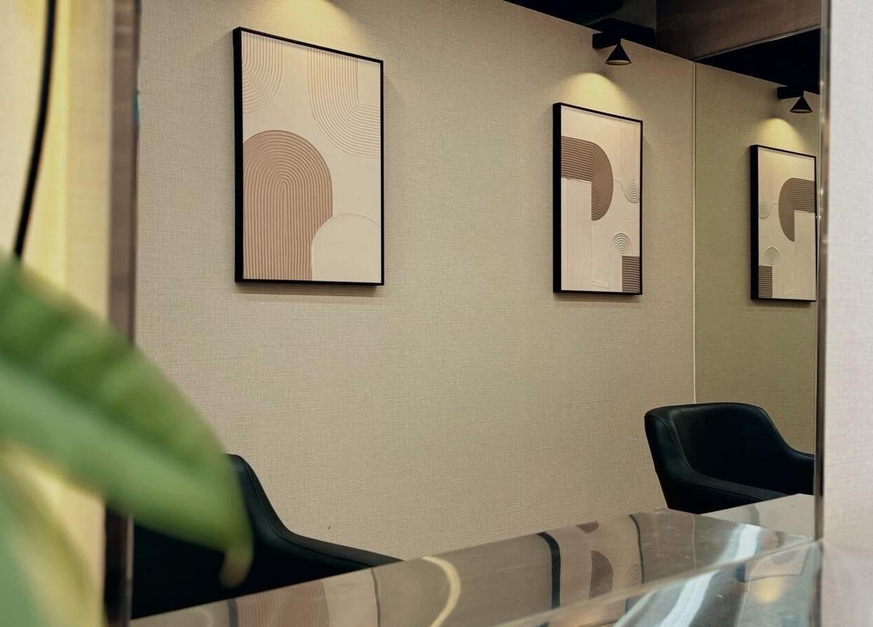 Contemporary art decorates the chic interior of 7percent hair studio in Singapore, SG.