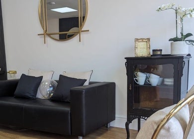 Stylish lounge at Love Your Hair, Totton, England, GB, with elegant decor and cozy seating.