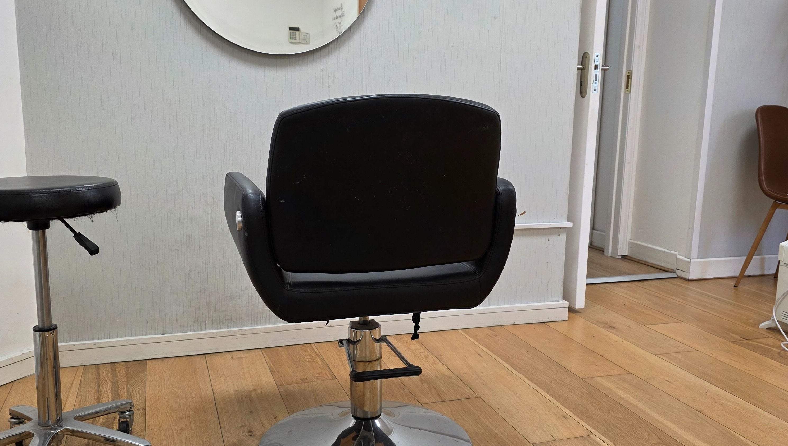 Hairdressing chair in stylish Guto Ribeiro venue, Dublin, County Dublin, IE.