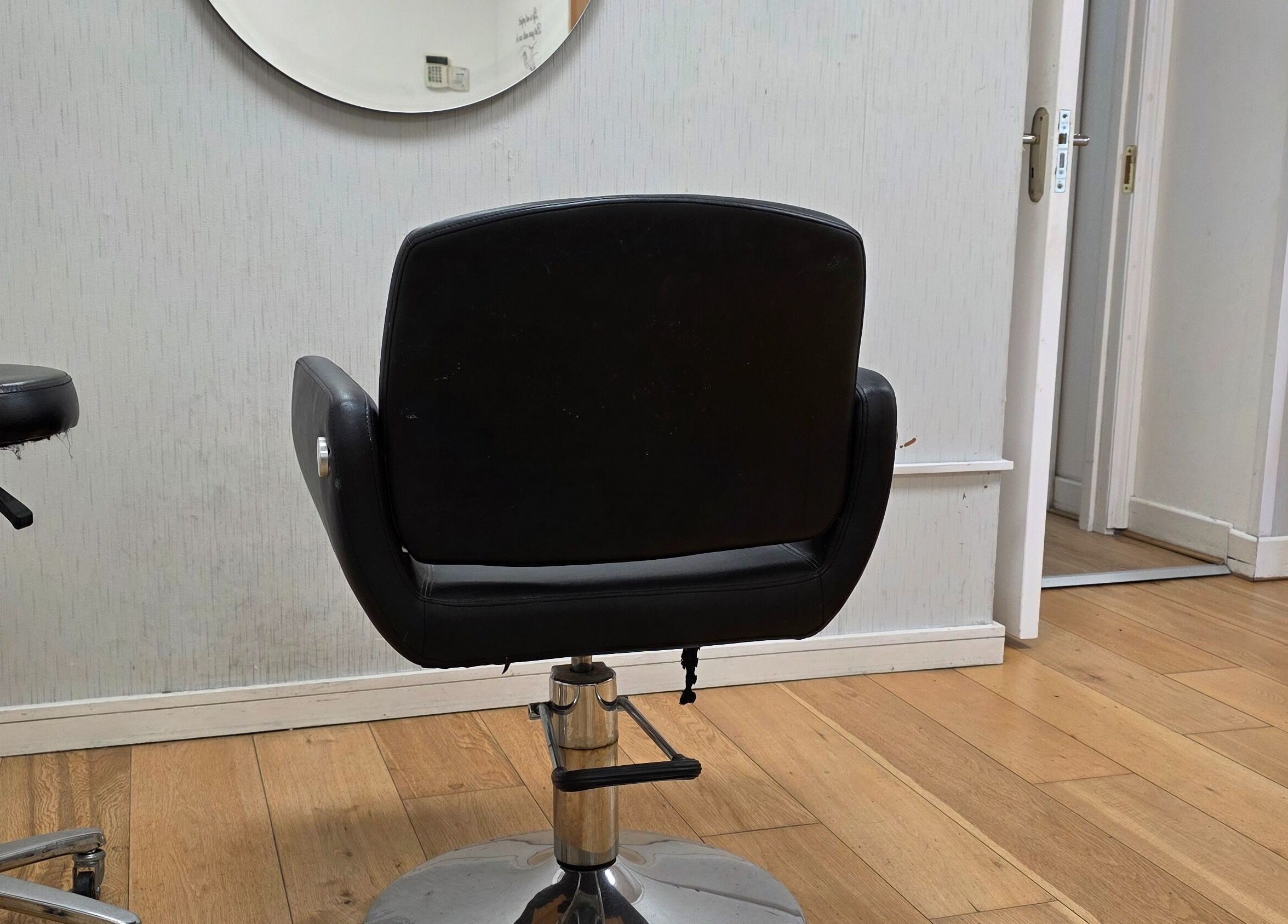 Hairdressing chair in stylish Guto Ribeiro venue, Dublin, County Dublin, IE.
