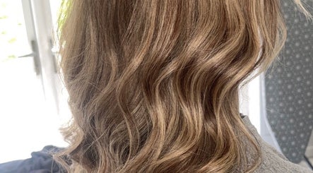 Elegant wavy hairstyle at K L Hair in Dunmurry, Northern Ireland, GB.