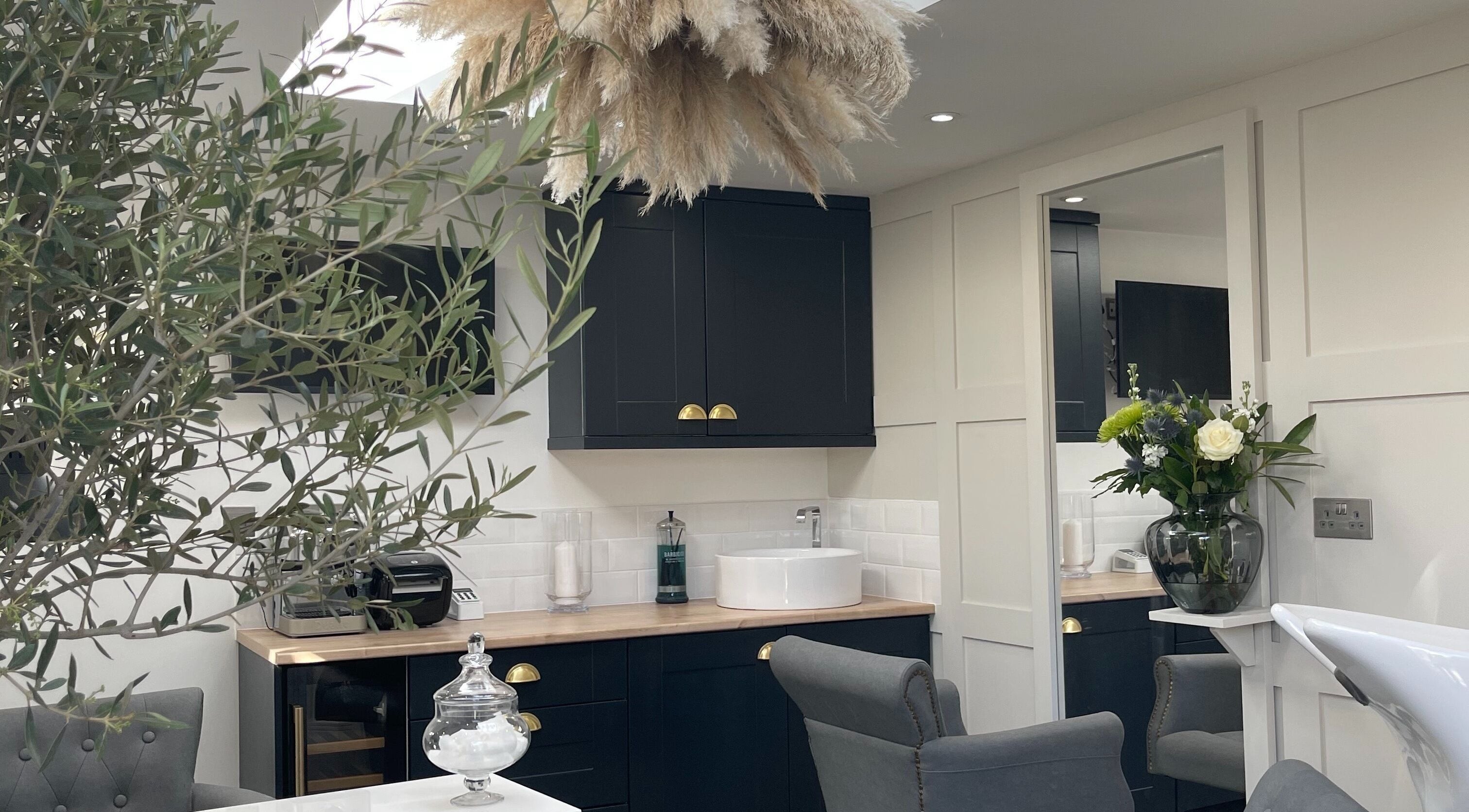 Stylish interior of The Garden Salon in Swindon, England, GB with elegant decor and floral arrangements.