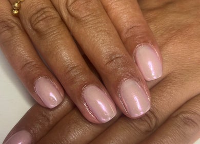 Elegant gel manicure at NailsbySa, Cardiff, Wales, GB, showcasing a refined, glossy finish on natural nails.