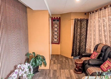 Elegant seating area at Jane Matraville Thai Massage, Matraville, New South Wales, AU with cultural decor.