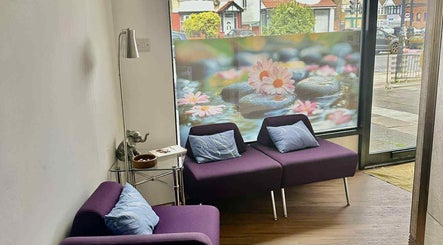 Relaxing seating area at Kenton Thai Massage Therapy Ltd. in London, England, GB with calming decor.