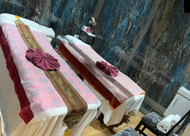 Relaxing massage tables at Kenton Thai Massage Therapy Ltd., London, England, GB with elegant decor.