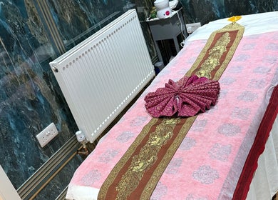 Relaxing massage table setting at Kenton Thai Massage Therapy Ltd., London, England, GB with elegant decor.